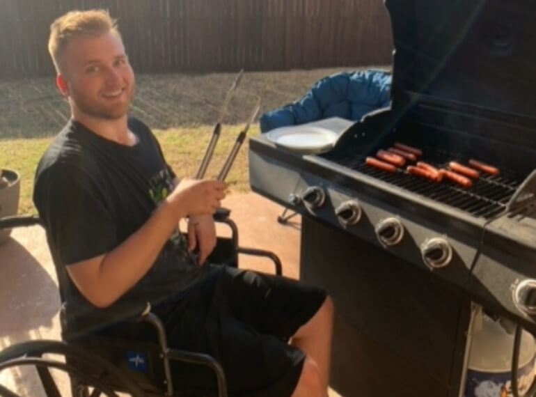 Brandon Reichling grilling after rehabilitation